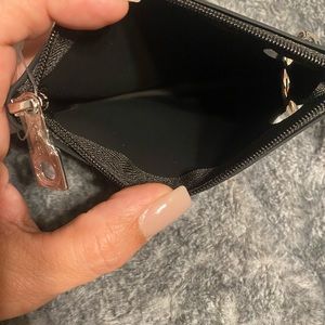Cute black, silicone, coin purse brand, new, never used